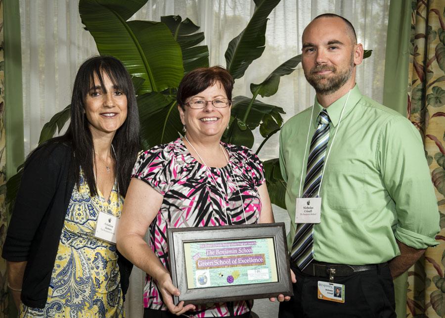 Left to right: Dr. James, Ms. St. Martin, and Mr. Crisafi accept the Green School of Excellence award for TBS at the West Palm Beach Marriott on May 9, 2014.