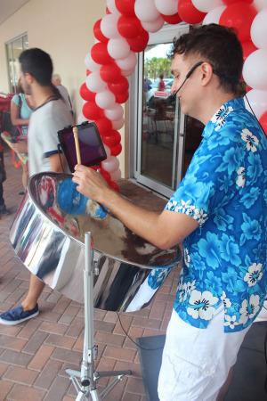 The island sounds of a steel drum welcomed customers.