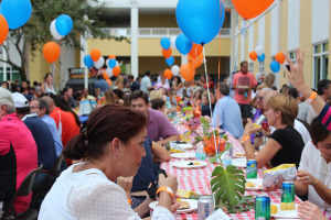 Families enjoy dinner before the game at the Upper School.