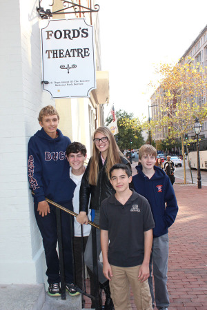 Chris Lutz, Ben Chait, Eva Hasenhuttl-Bishop, Chris canino, and Hunter Johnson pose outside of Ford's Theater before taking the tour.