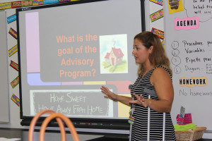 Sixth-grade science teacher Mrs. Mandy Sukhu explains the purpose of advisory to parents.