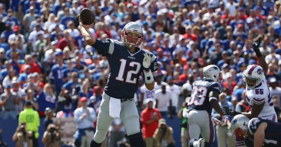 Brady throws a pass against the Buffalo Bills on September 20, 2015. With the revoked suspension, Brady is off to a torrid start, throwing for 754 yards, 7 touchdowns, and no interceptions in the first two games of the season.