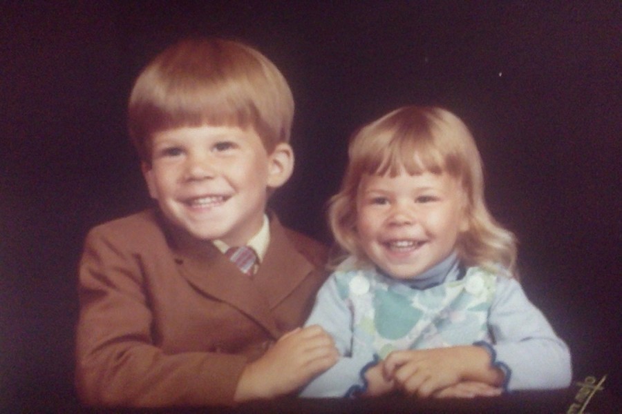 Who do you think the little towhead is on the right? Be sure to put your answer and name in the comment section below.