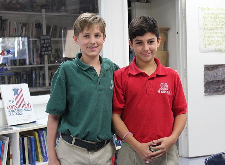 Eighth grader Jakob Mendelsohn (left) poses with seventh-grade runner up Max Paksima after winning the geography bee on Tuesday, February 2.