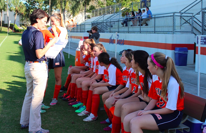 Mrs. Ponchock addresses the team prior to the teams semi-final game against St.  Marks. THe Bucs won 8-0.