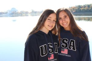 Emma Shirzad and Kayla Schneider pose in front of the Tidal Basin in DC