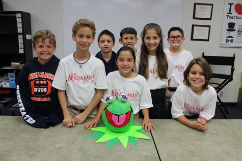 Mr. Crisafi's sixth-grade advisees pose with their first-place Kermit the Frog pumpkin (left to right): Jonathan Skatoff, Eric Levine, Frankie Ciprianni, Kate Grande, Jasper Wright, Emilie DUbiel, Ryan Motto, and Brin Poswencyk. 