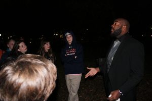 Chris Lappert listens to Mr. Chad Eric Smith who led one of the group's ghost tours in the capital.