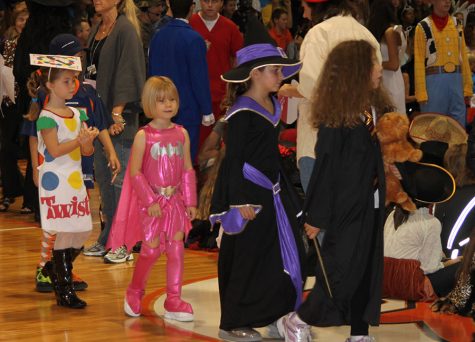 Current seventh grader Ainsley Mitchell dressed as Bat Girl when she was a first grader in the 2011 parade.