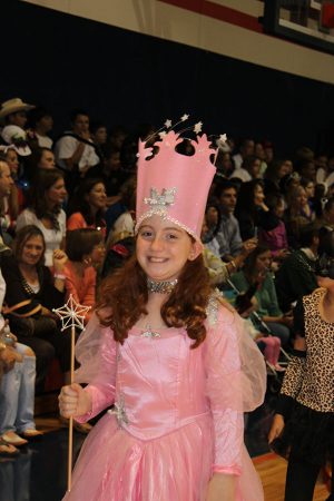 Current eighth grader ALex Kahn is pretty in pink during the 2011 Halloween parade which was held in the gym due to inclement weather.