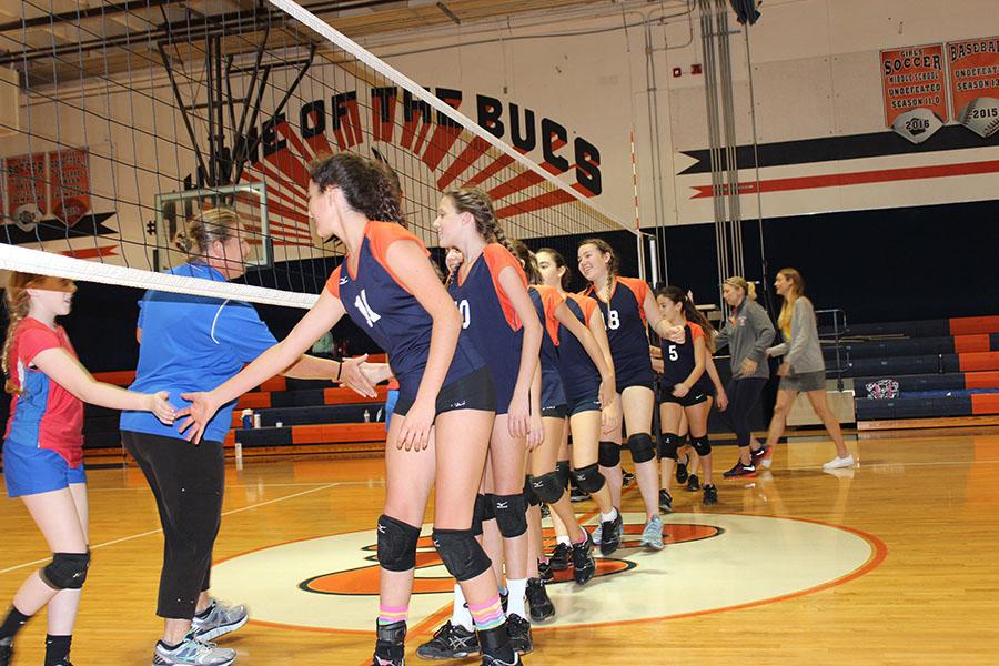 The Bucs shake hands with The King's Academy Lions after beating them on October 11, 2016.