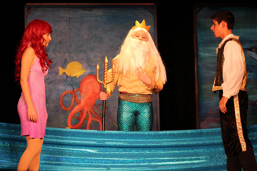 Ariel (Grace Myers, left) finally becomes part of Prince Erics (Cameron Salehi) world with the blessing of her father, King Triton (Brooke Hayes).