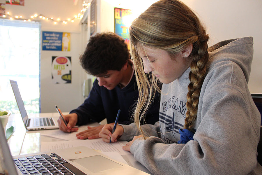 Eighth graders Ryan Casey (left) and Kate Small get started on their assignments during Mr. Maddoxs study hall period on Tuesday, October 26, 2017.