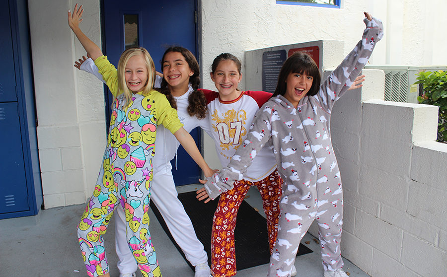 Sixth graders Emma Nordland, Elena McDonough, Madison Kittendorf, and Tara Citanak show off their comfortable sleepwear on Tuesday, October 17, 2017.