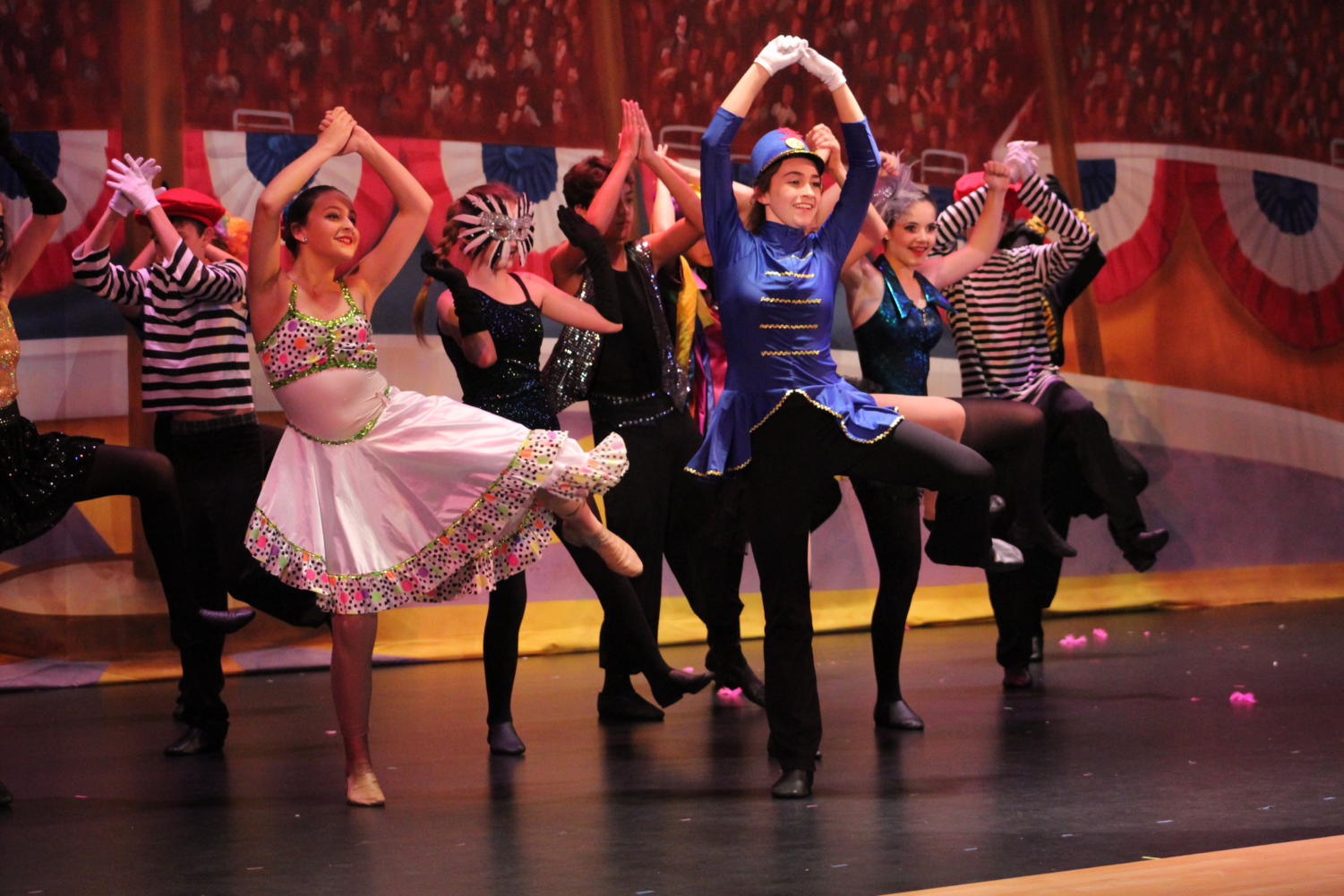 Eighth grader Madi McVey (center) leads Mrs. Rudner's dance classes in their