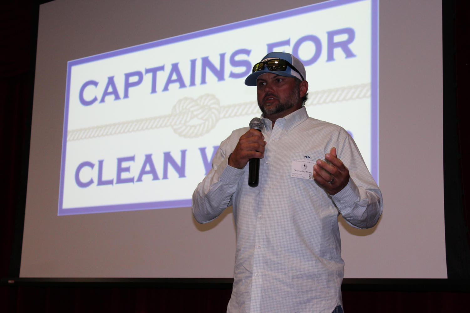 Boat captain Chris Wittman explains the dire state of the Everglades to the middle school students on August 4.