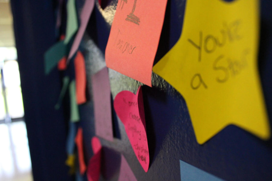 Positive notes made by students adorn Mr. Crisafis classroom door after his brother-in-law passed away earlier this year.