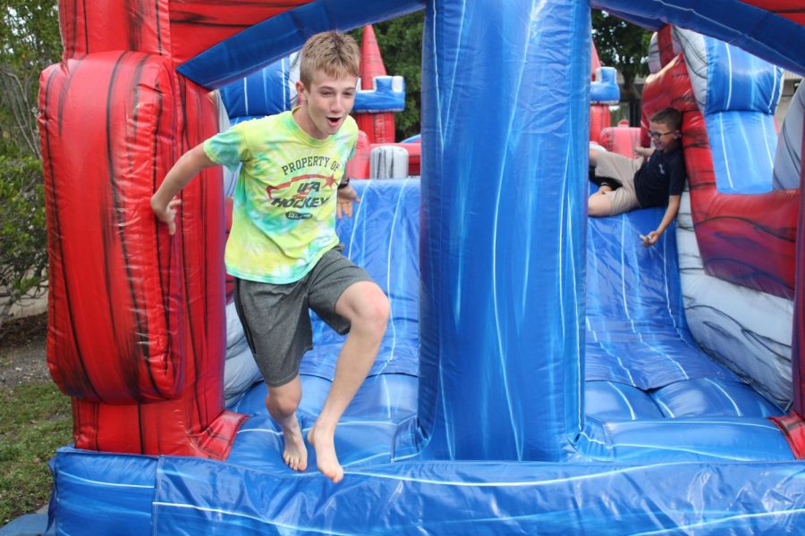 Max Wendler is racing to the finish line as he travels through the bouncy house.