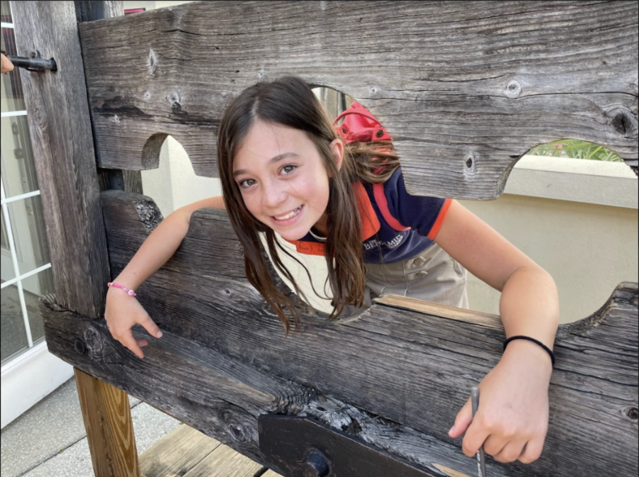 Students+loved+visiting+the+pirate+museum%21+While+there+they+saw+a+pillory+and+sixth+grader%2C+Maddie+Lemanski+poses+for+a+picture.+