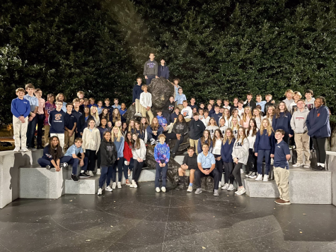 Eighth-grade class of 2027 poses in front of the Albert Einstein statue