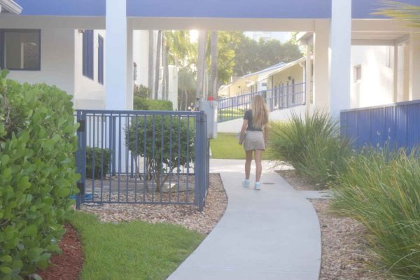 Benjamin student walks to class